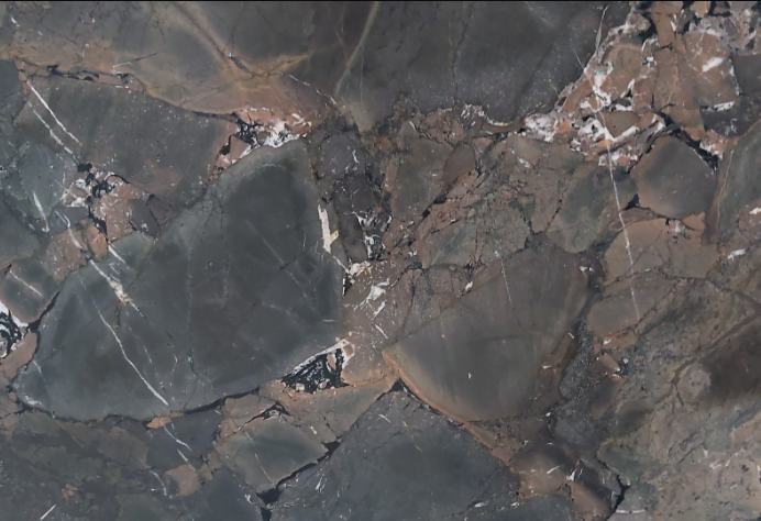 Granit Infinity w kolorze szarym z brązowym odcieniem